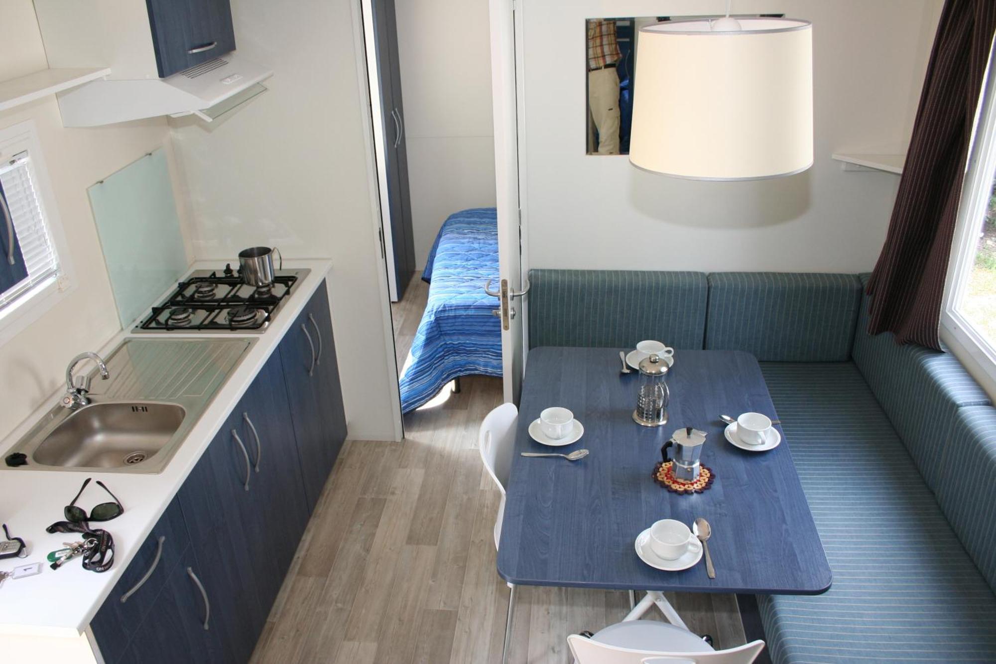 Happy Camp Mobile Homes In Camping Villaggio Internazionale Сан Менайо Екстериор снимка